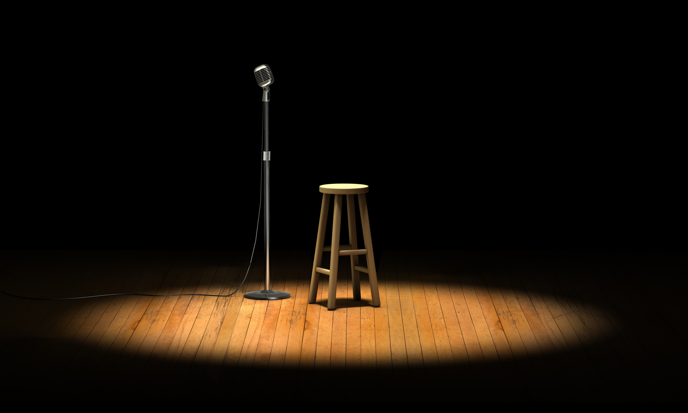A bench and a microphone on stage