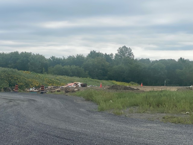 Landfill site showing a gravel road